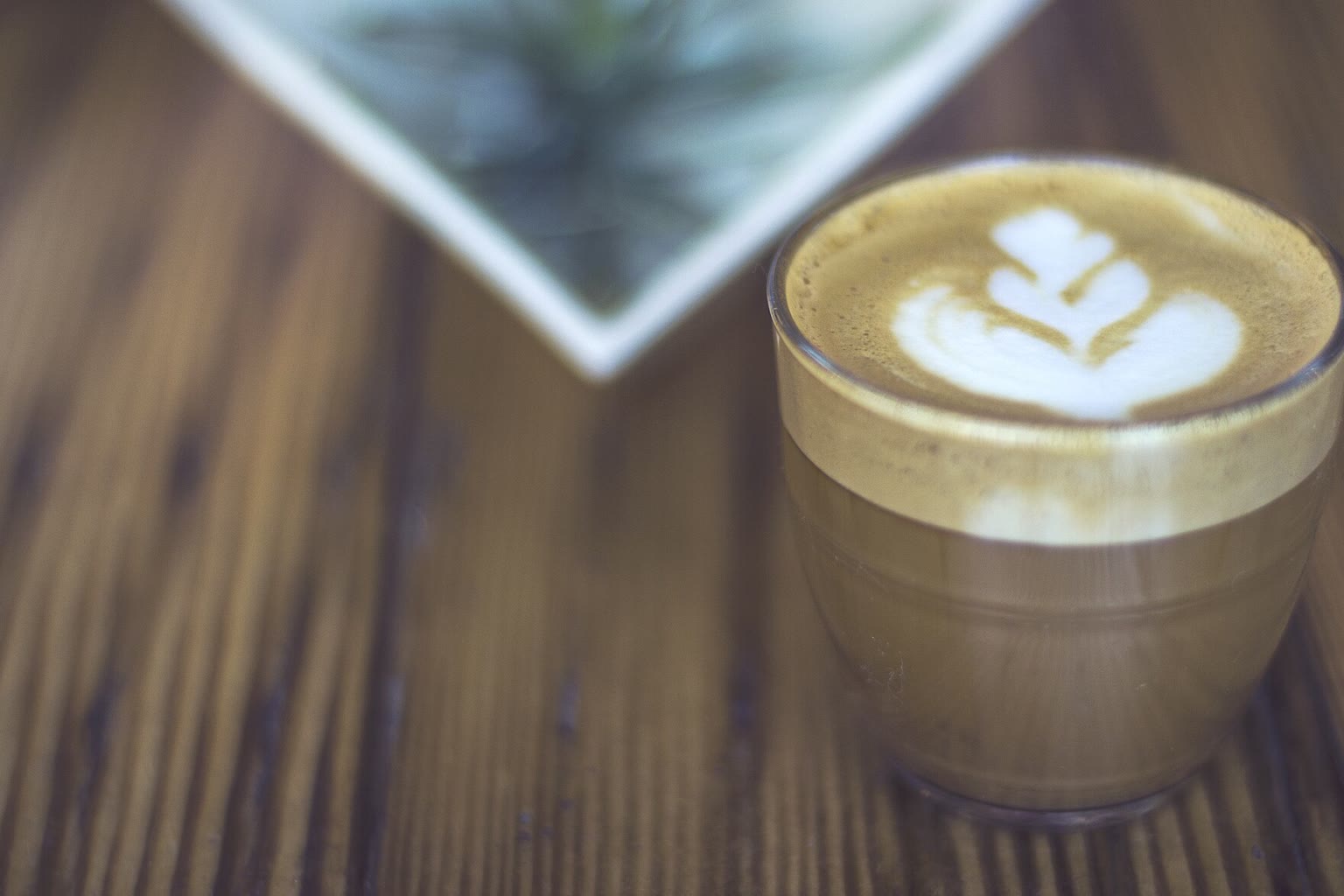 Frothy coffee with melting butter