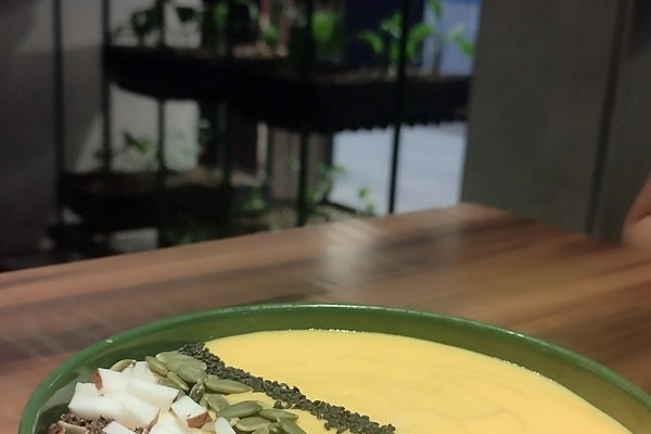 Dairy Kefir Smoothie Bowl with Pineapple, Granola, and Coconut Flakes