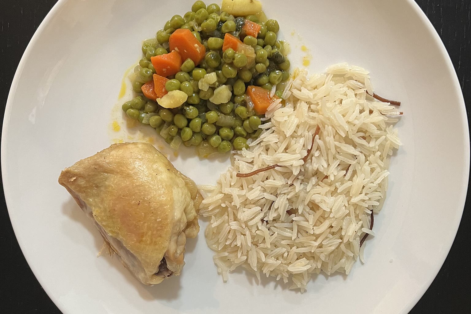 Plate chicken rice roasted vegetables