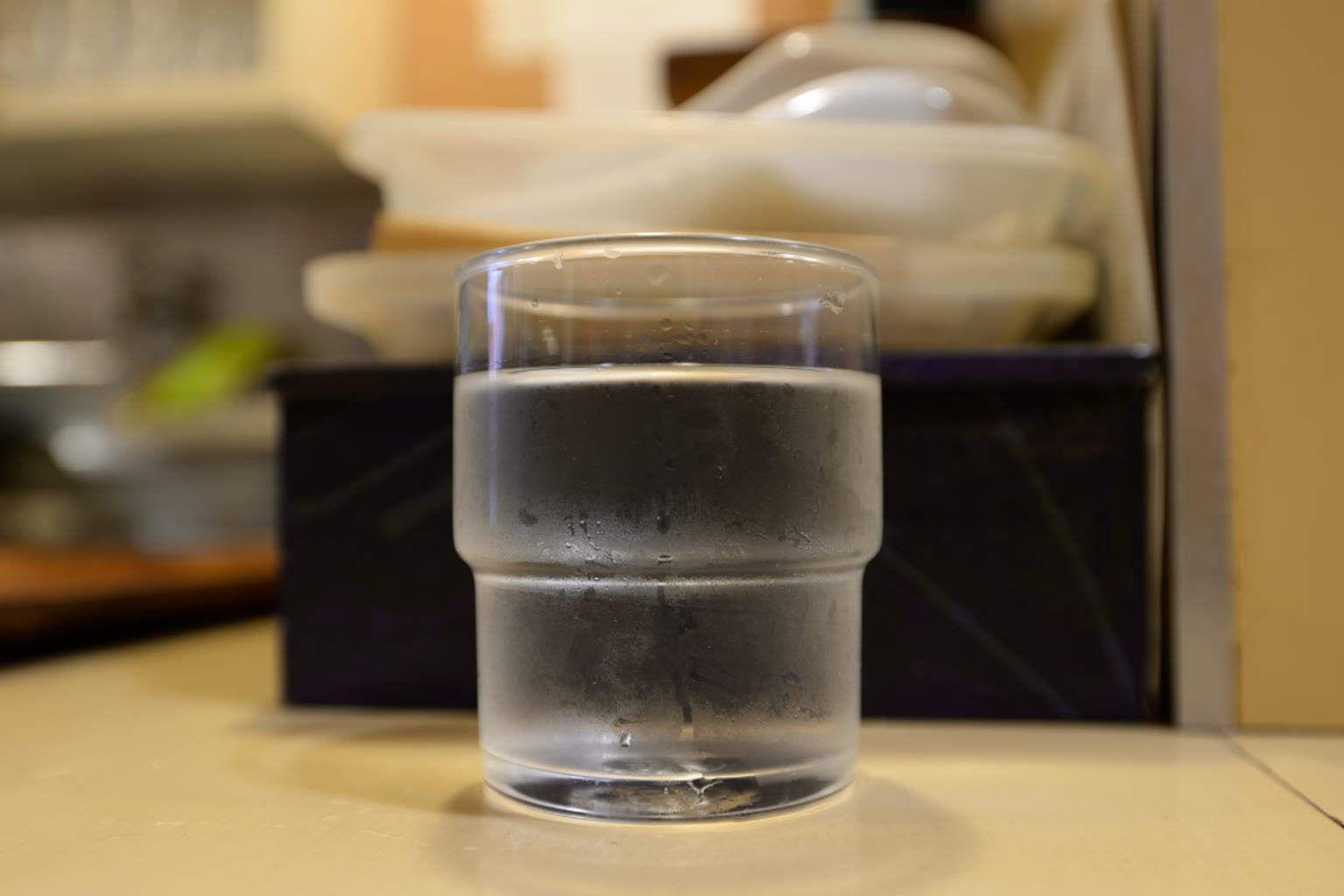 Ice water glass with condensation