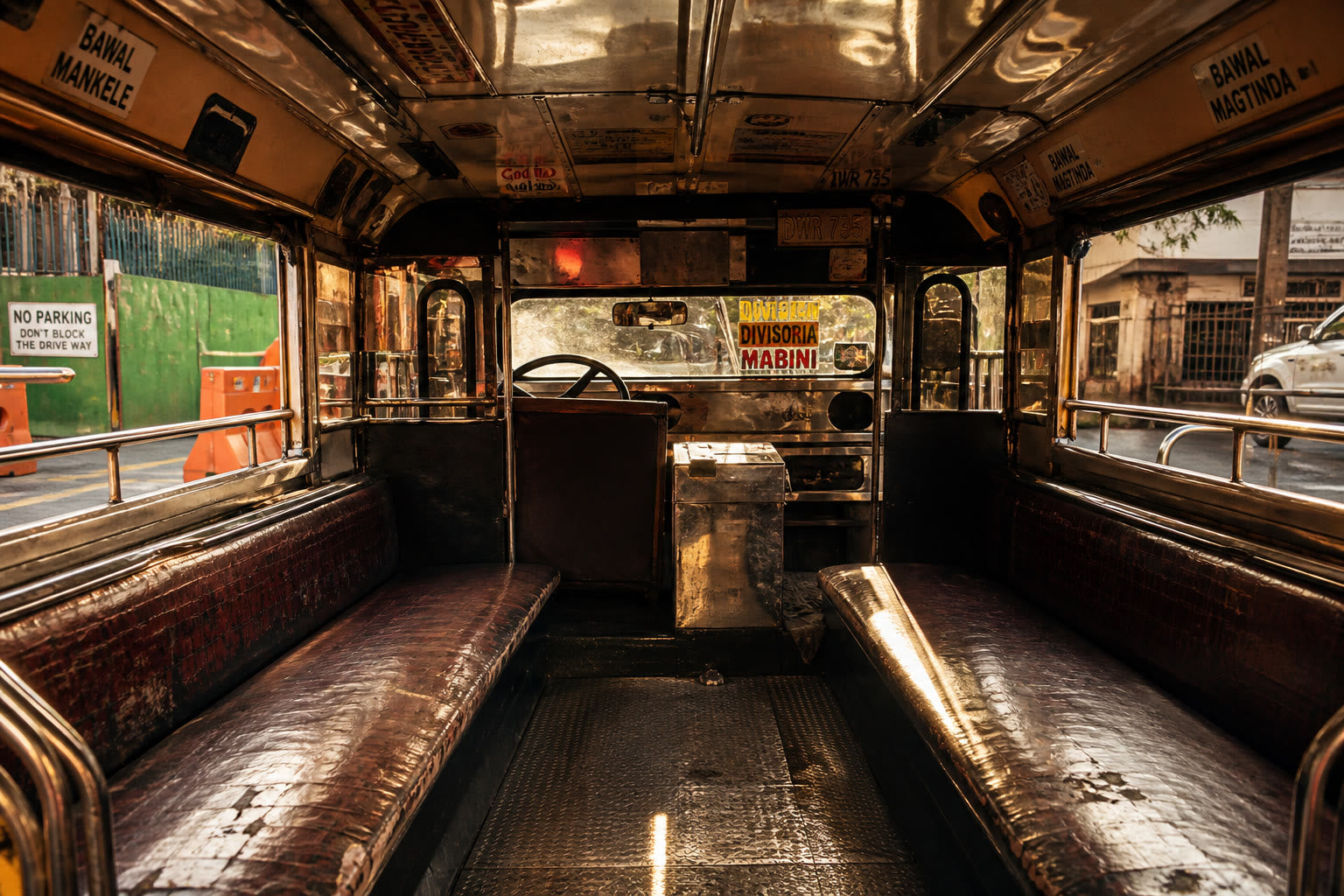Interior of a traditional Filipino jeepney with low bench seating