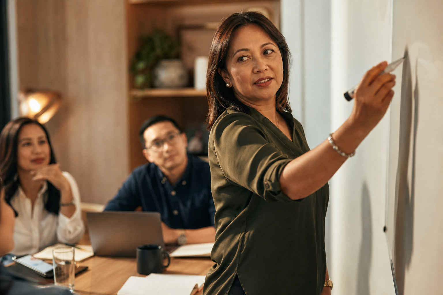 Filipino woman in her 40s in a leadership role