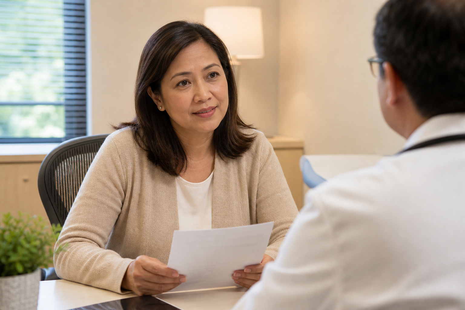 Filipino woman in her 40s at a follow-up doctor's appointment