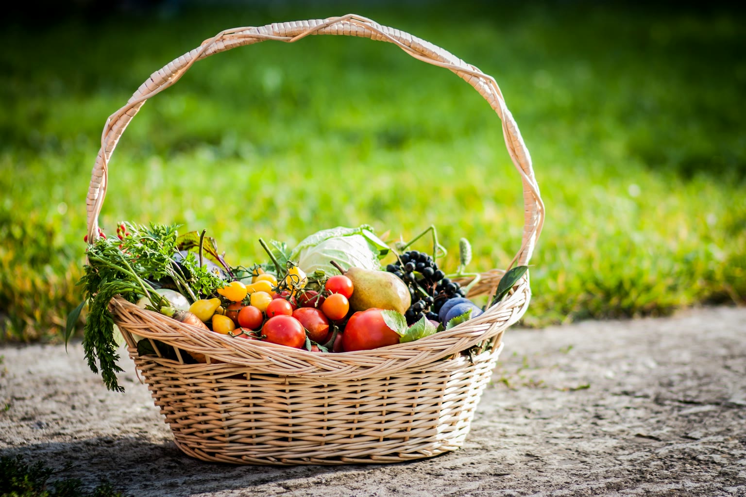 A grocery basket with a rotating mix of different vegetables and fruits.