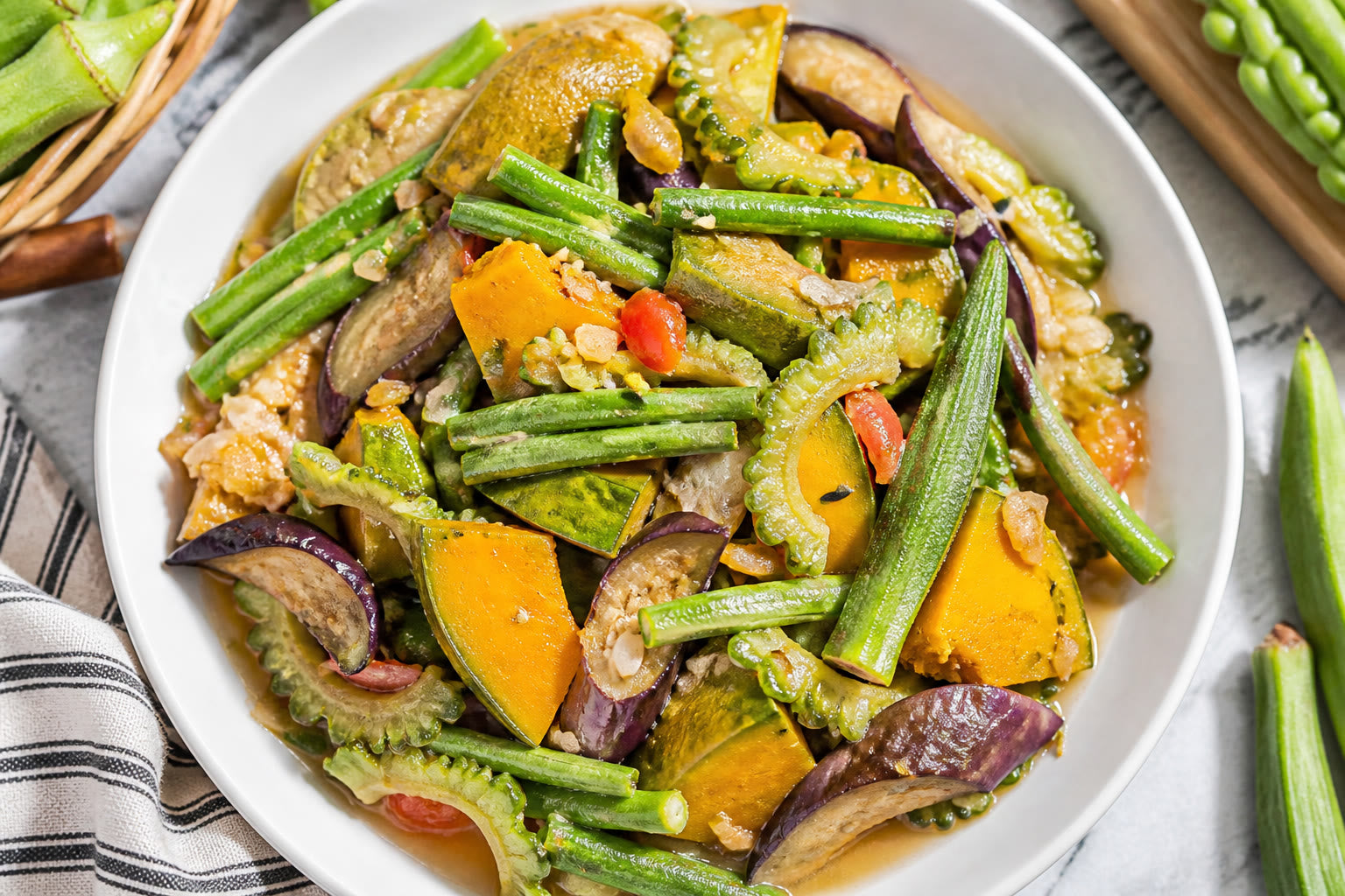 Overhead plate of pinakbet showing mixed Filipino vegetables