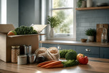 Kitchen being restocked with fresh produce beside remaining canned goods