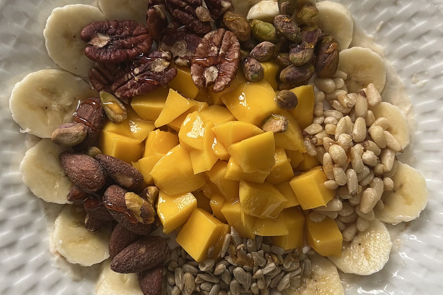 Bowl of bananas apricots potato