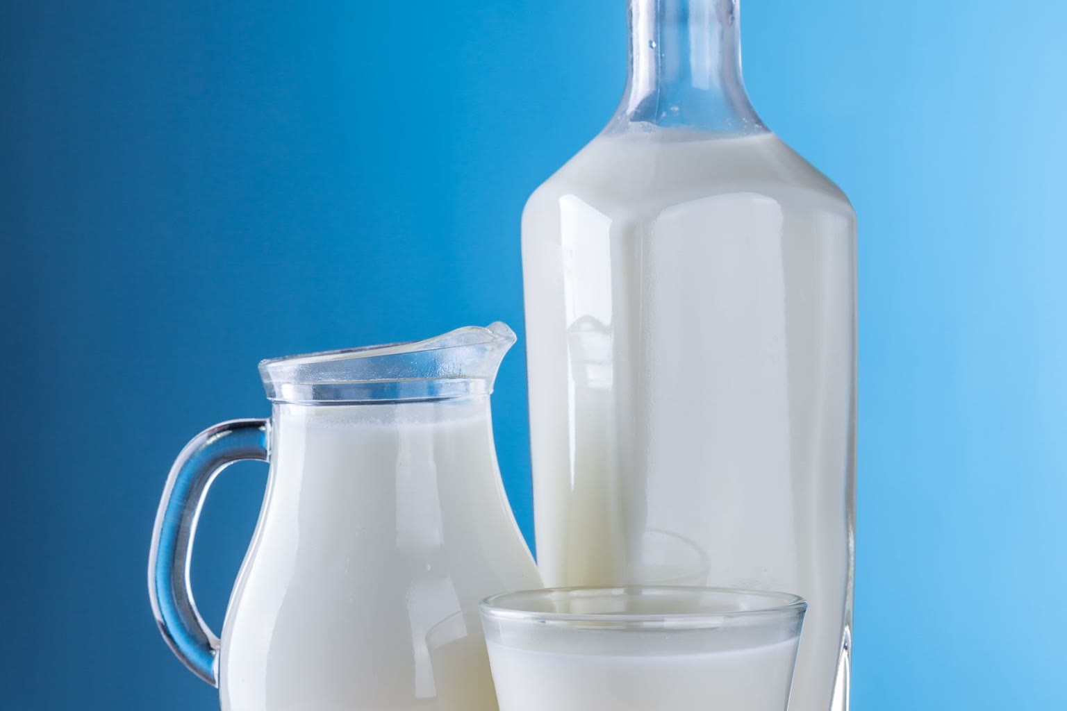 Glass milk bottle on wood table