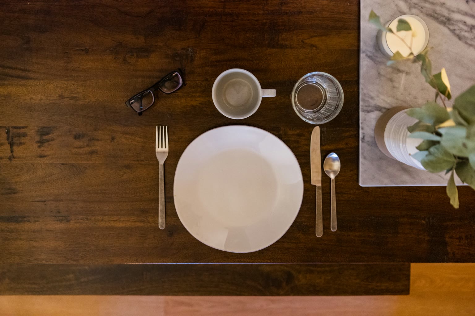 Empty plate and glass of water